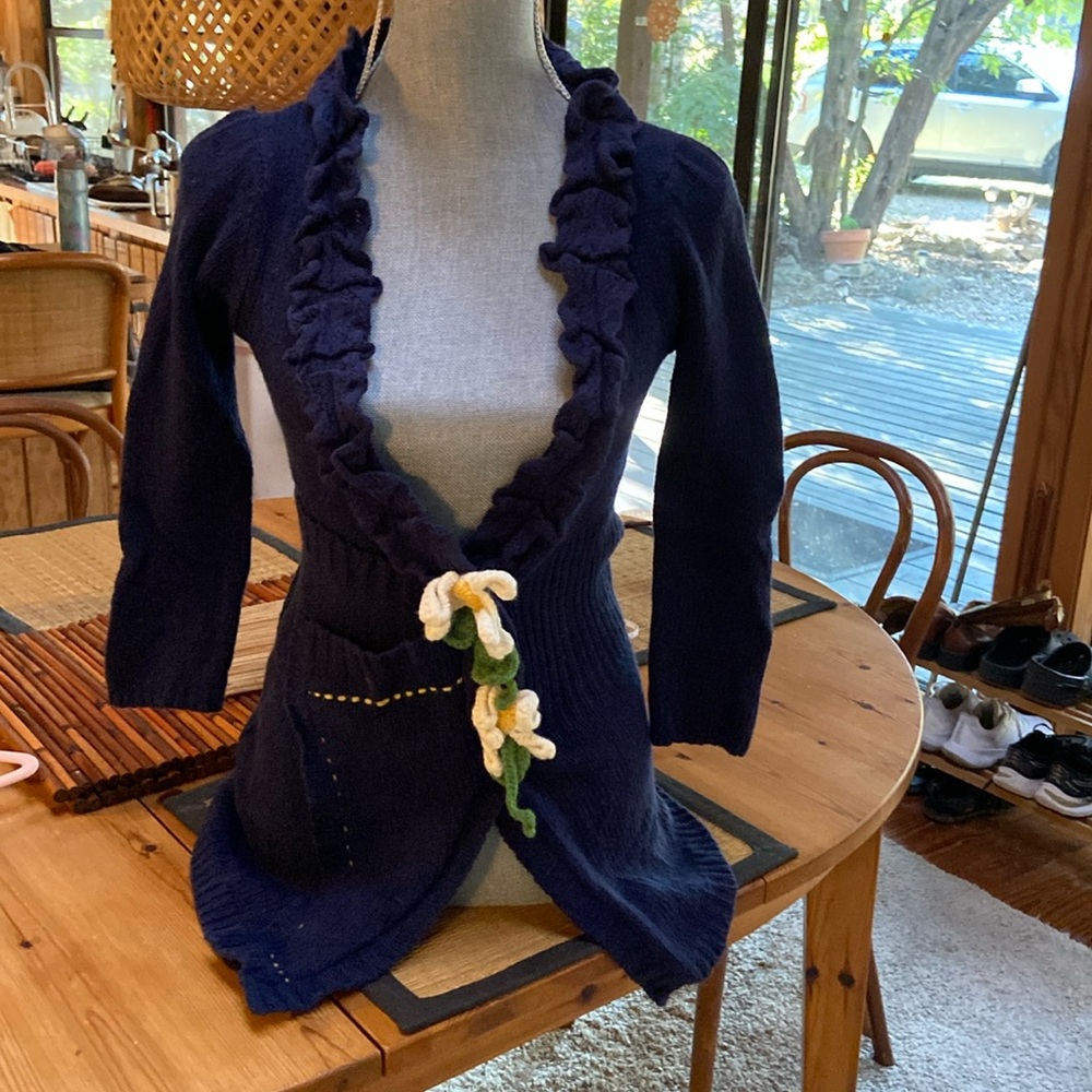 The cutest “Field Flower” brand sweater. Crocheted flower motives.